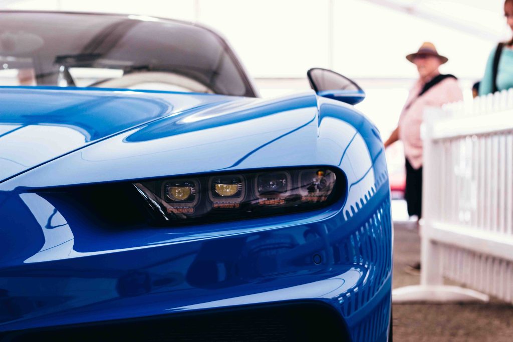 closeup-shot-of-a-cool-luxurious-blue-car-ready-to-2023-11-27-04-53-16-utc_3_11zon